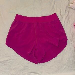 CRZ YOGA Mid Waisted Dolphin Hem Athletic Shorts